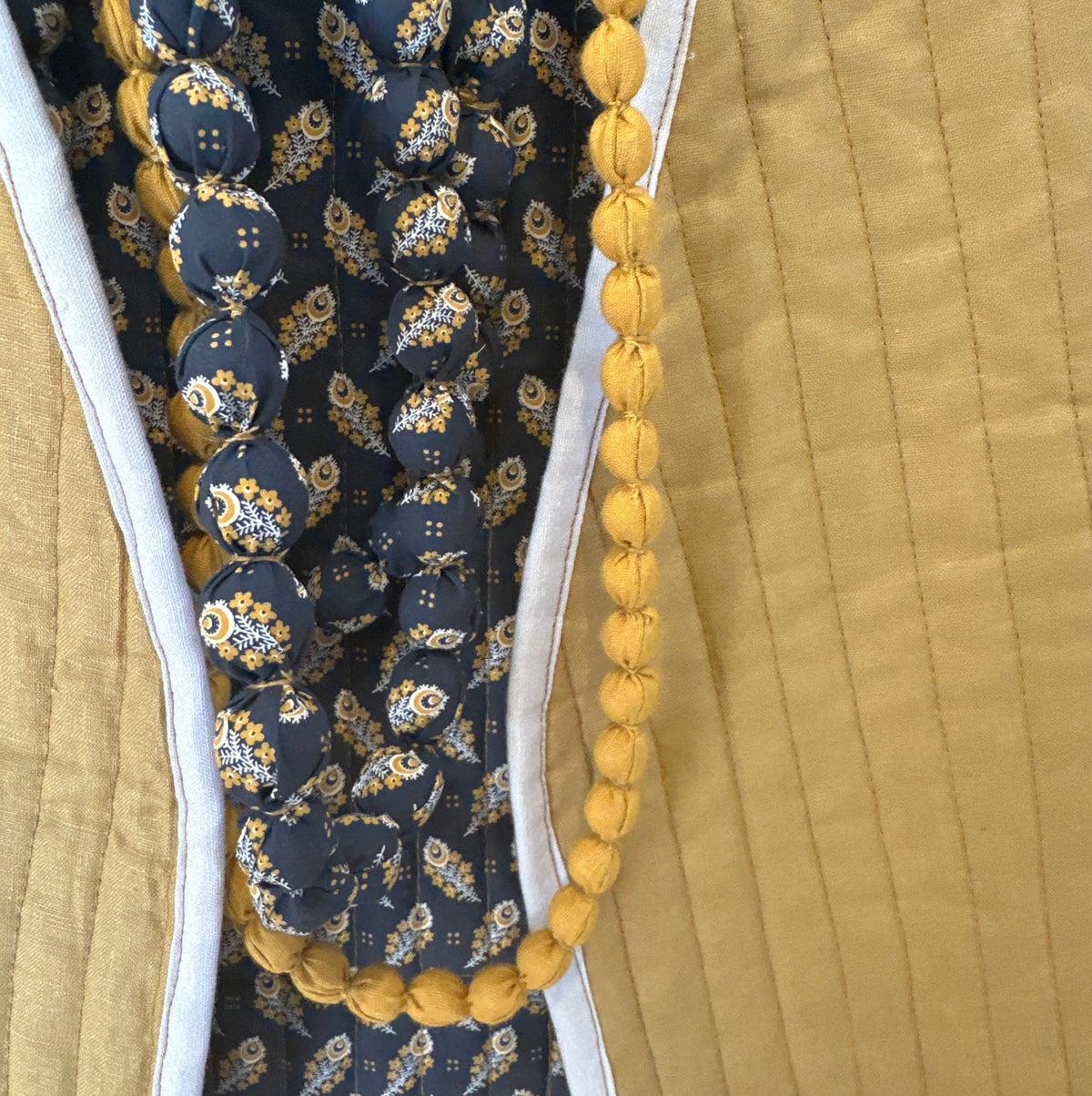 The Sunwashed Quilted Vest