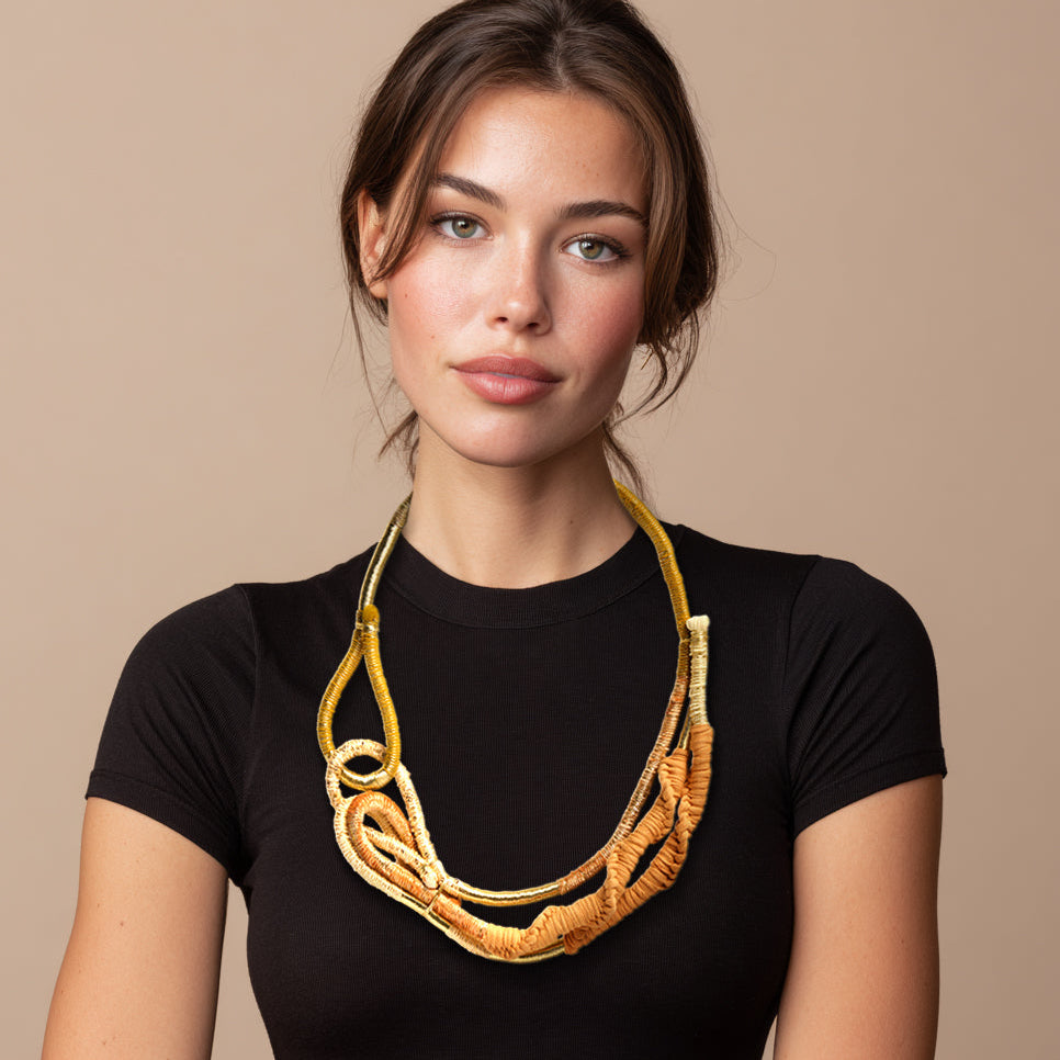 handmade statement necklace in gold beige